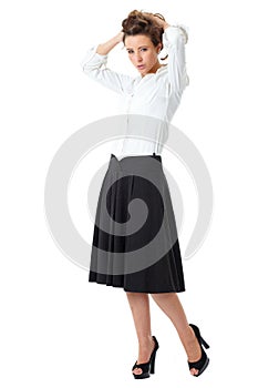 Attractive female in white shirt and black skirt