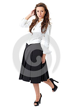 Attractive female in white shirt and black skirt