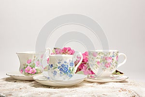 Attractive fine bone china tea cups on a neutral background photo