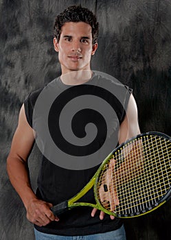 Attractive, Fit Man With Tennis Racket
