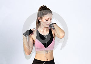 Attractive fitness woman, trained female body,Attractive fitness woman with top and mp3 player, caucasian lifestyle portrait, cauc