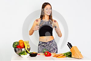 Attractive fitness woman, trained female Fit power athletic confident young woman bodybuilder doing exercises , Organic Food.