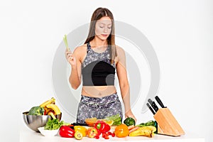 Attractive fitness woman, trained female Fit power athletic confident young woman bodybuilder with Evegs, Organic Food.