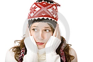 Attractive freezing woman with cap and scarf