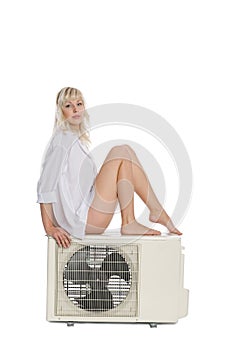 Attractive girl advertises air conditioner photo