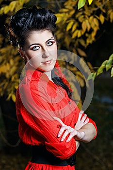 Attractive girl in the autumn park