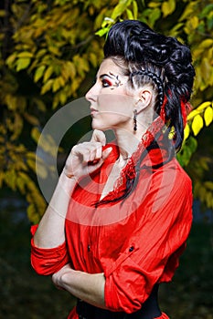 Attractive girl in the autumn park