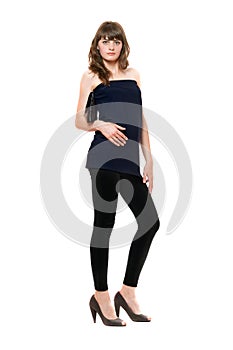 Attractive girl in a black leggings. Isolated