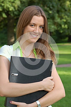 Attractive girl with folder