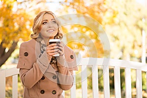 Attractive girl getting refreshment with coffee