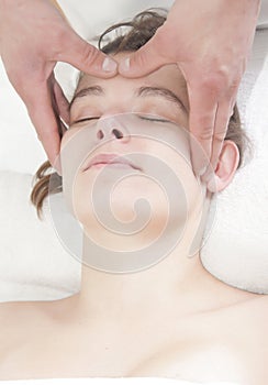 Attractive girl head massage spa