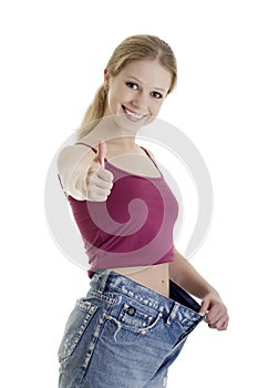 Attractive girl in jeans lost weight