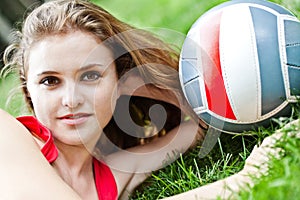 Attractive girl lay on grass