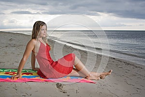 Attractive girl looking to the sea