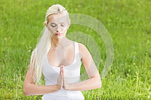 Attractive girl in lotus pose