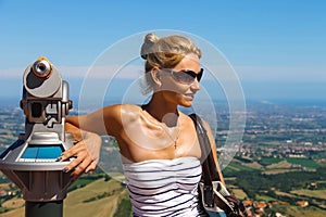 Attractive girl on the observation deck fortresses of San Marino