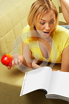 The attractive Girl & red apple