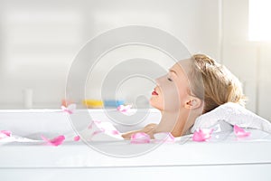 An Attractive girl relaxing in bath