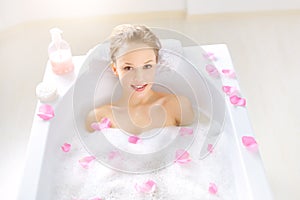 An Attractive girl relaxing in bath