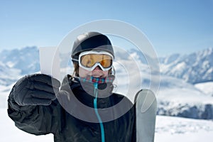 Attractive girl with ski ticket