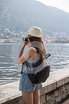 Attractive girl taking photos