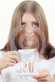 Attractive girl with white mug