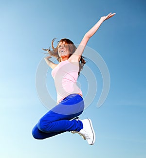 Attractive girl Young woman jumping sky