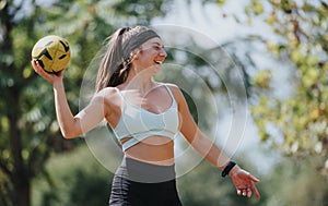 Attractive Girls Having Fun Throwing Ball in Park