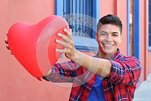 Attractive guy celebrating Saint Valentines