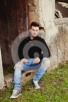 Attractive guy in a old house