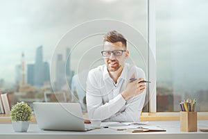 Attractive guy working on project