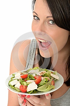Attractive Happy Healthy Natural Young Woman Holding a Plate of Fresh Chicken Salad
