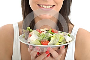 Attractive Happy Healthy Young Woman Holding a Plate of Fresh Chicken Salad