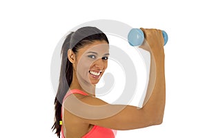 Attractive happy latin woman holding weight dumbbell doing fitness workout