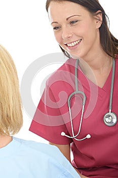 Attractive Happy Professional Young Female Doctor Having A Conversation With A Patient