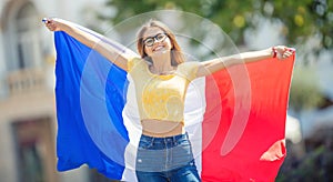 Attractive happy young girl with the Belgian flag photo