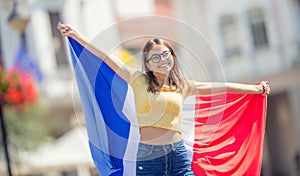 Attractive happy young girl with the Belgian flag photo