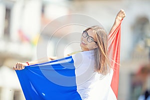 Attractive happy young girl with the Belgian flag photo