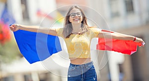 Attractive happy young girl with the Belgian flag photo