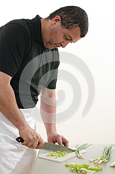 Attractive latin american man cooking
