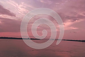 The attractive look of sky after sunset with bridge and river