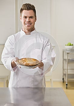 Attractive male with pie.