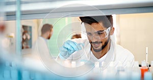 Attractive student of chemistry working in lab