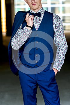 Attractive man in a blue suit