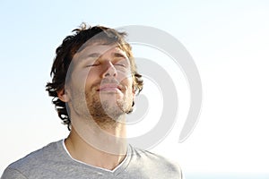 Attractive man breathing outdoor