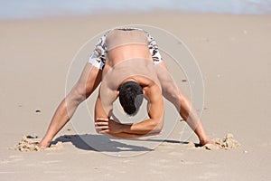 Attractive man making stretching