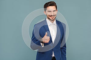 Attractive man with mustache showing like sign at camera