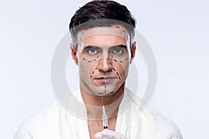 Attractive man at plastic surgery