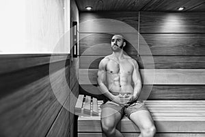 Attractive Man Resting Relaxed In Sauna