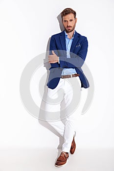 Attractive man in smartcasual clothes with arms crossed